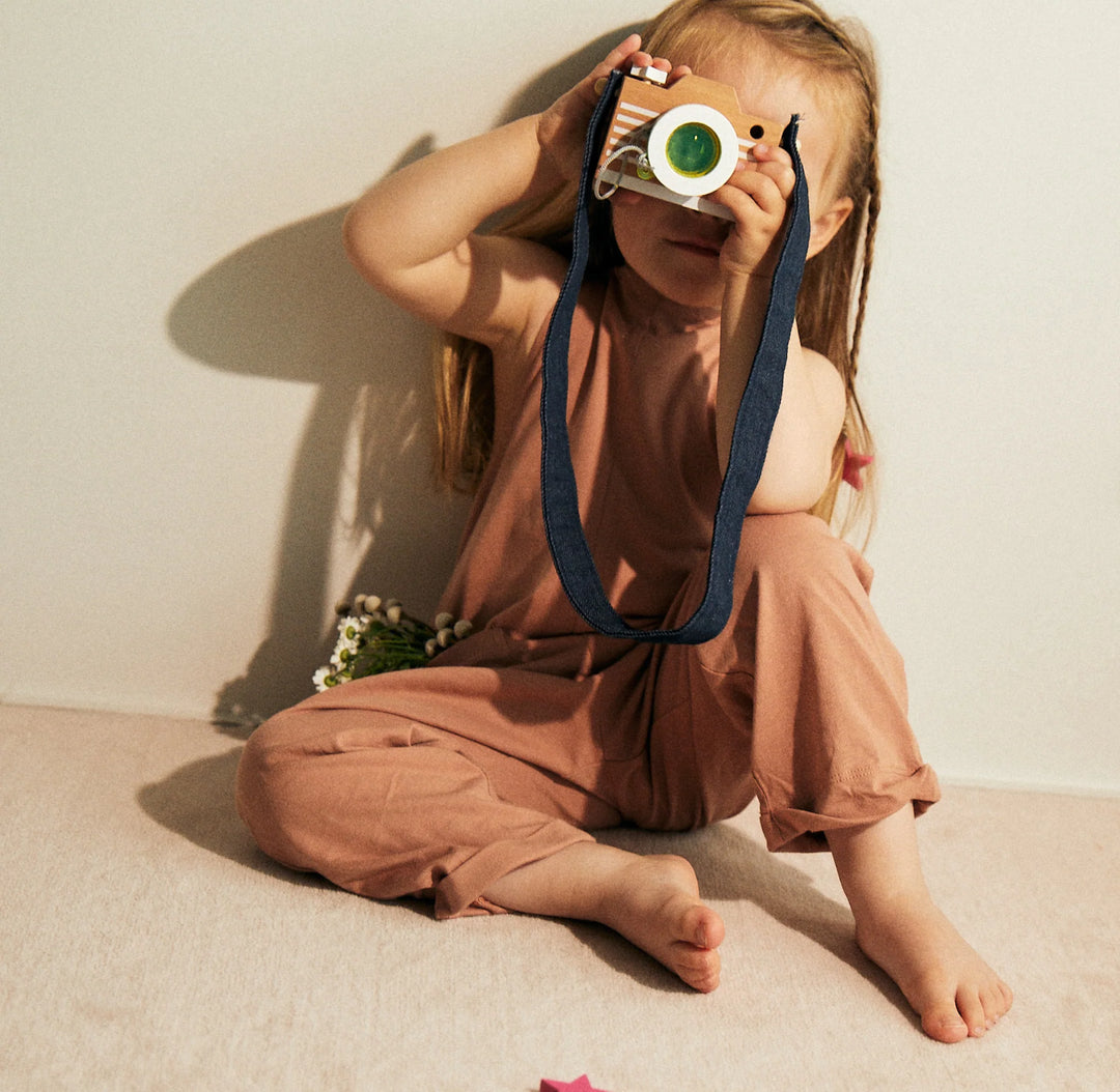 Fille avec Appareil photo kaléidoscopique