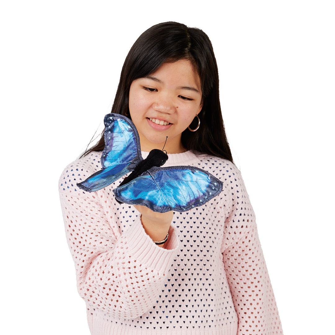 Fille avec Marionnette à doigt Papillon morpho bleu