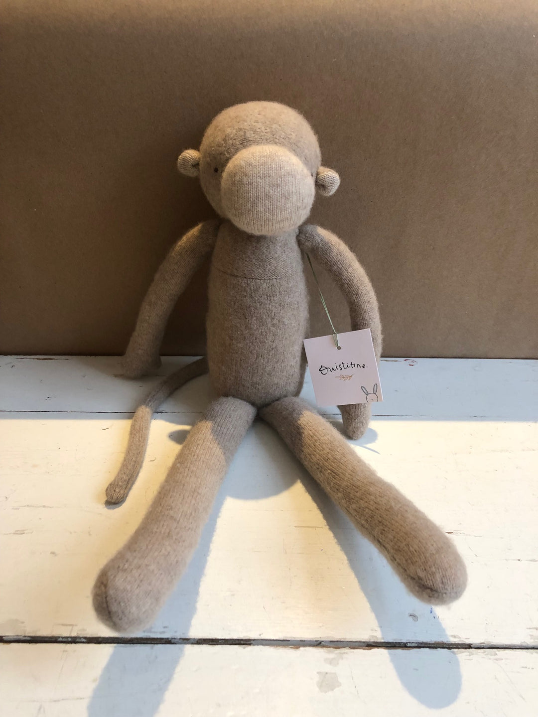 Peluche en tissu beige Ouistiti
