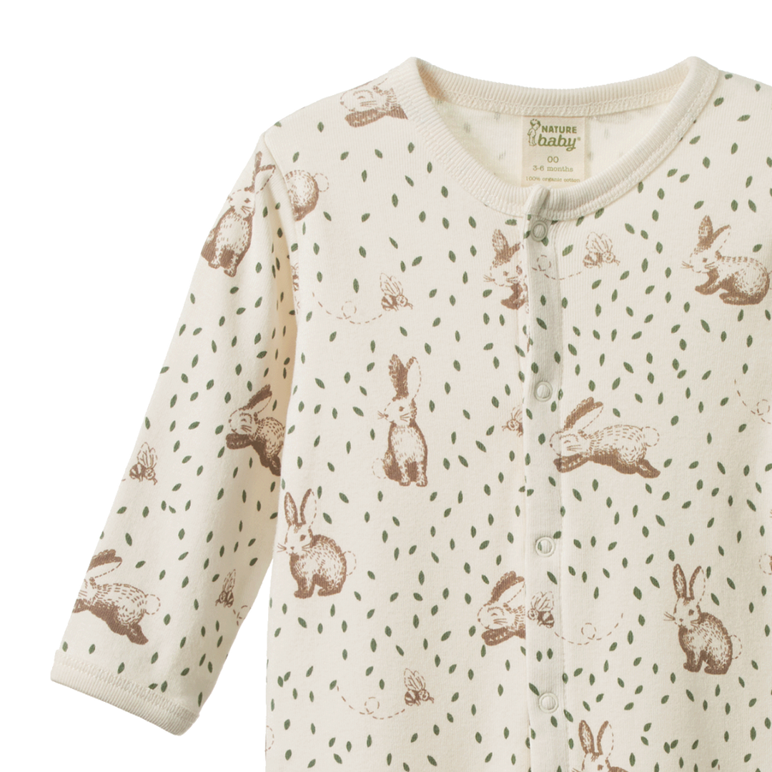 Pyjama à pattes en coton beige avec imprimé lapins