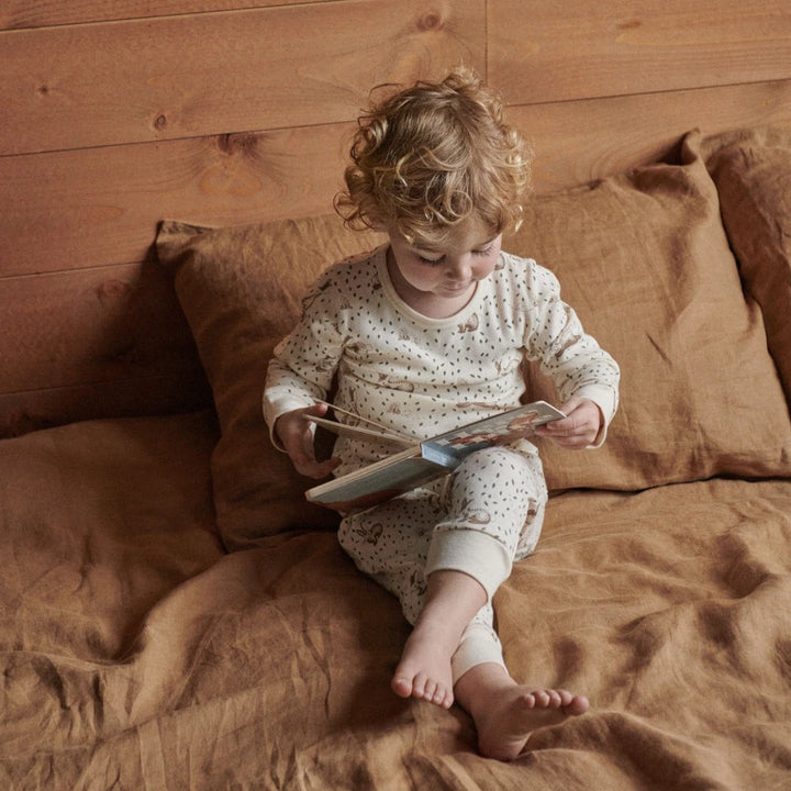 Enfant avec Pyjama manches longues en coton beige avec imprimé lapins