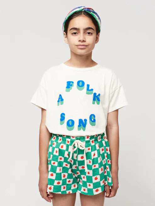 Fille avec Short pour enfant en coton bio carreaux verts et blancs avec tomates