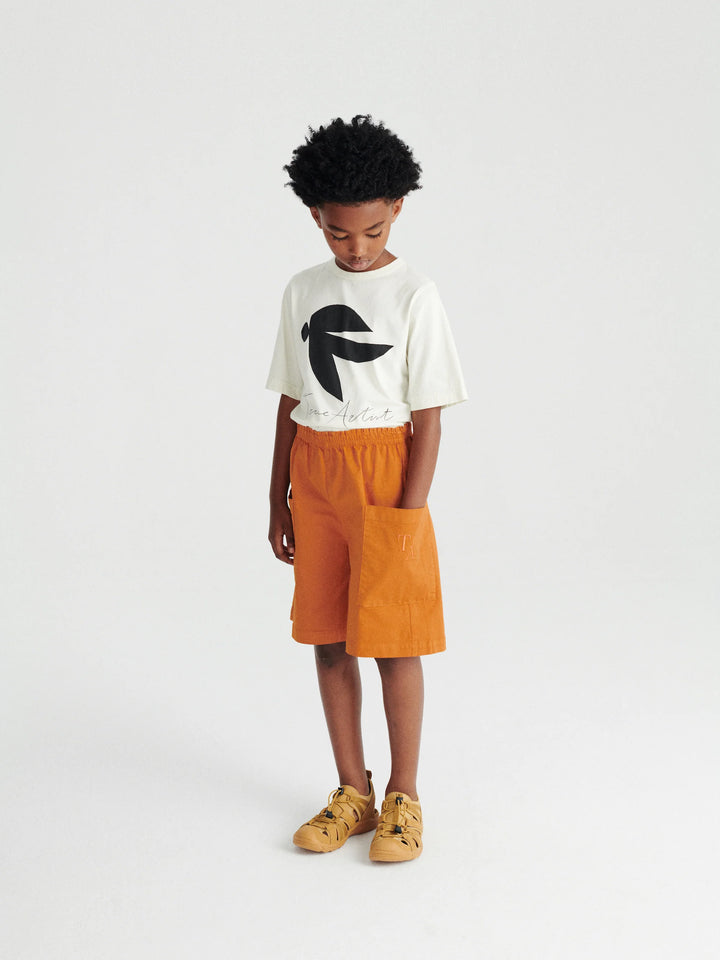 Garçon avec Shorts pour enfant True Artist en coton orange avec poches