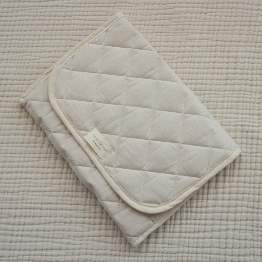 Tapis de change en coton crème