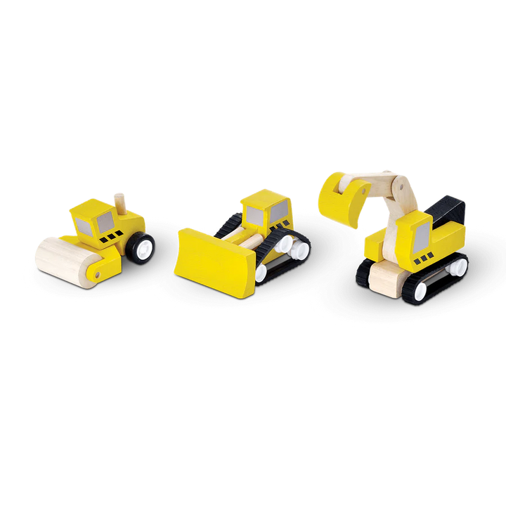 Trio de camions jaunes de construction en bois