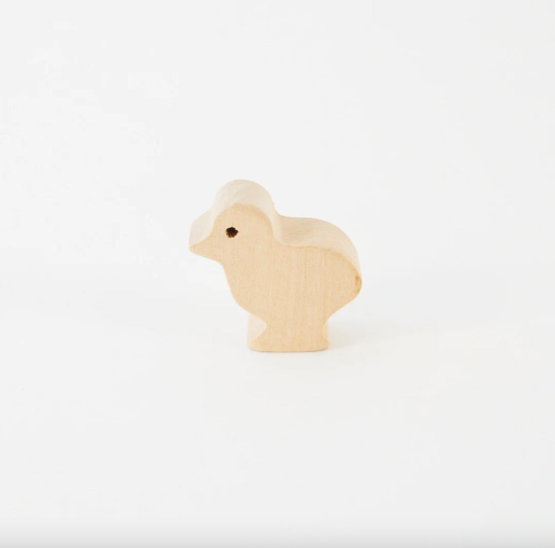 Bébé poussin en bois