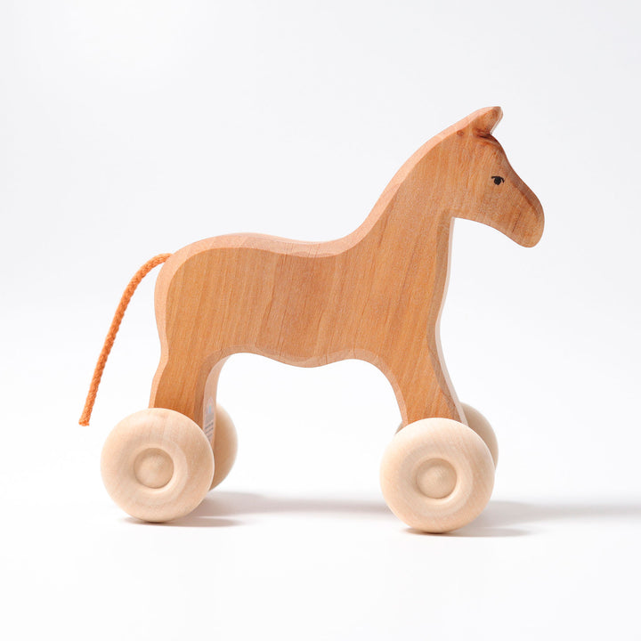 Cheval en bois a rouler