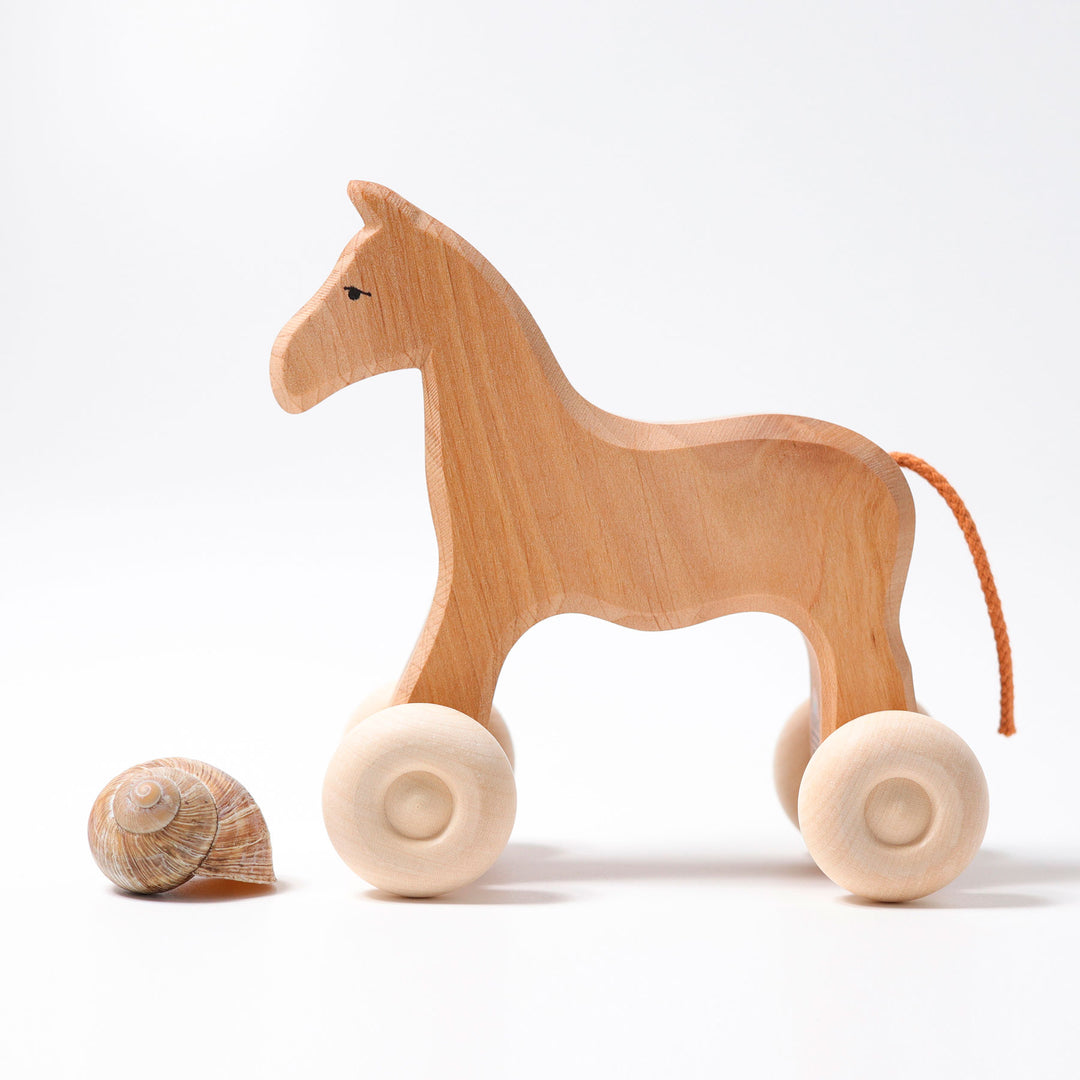 Cheval en bois a rouler