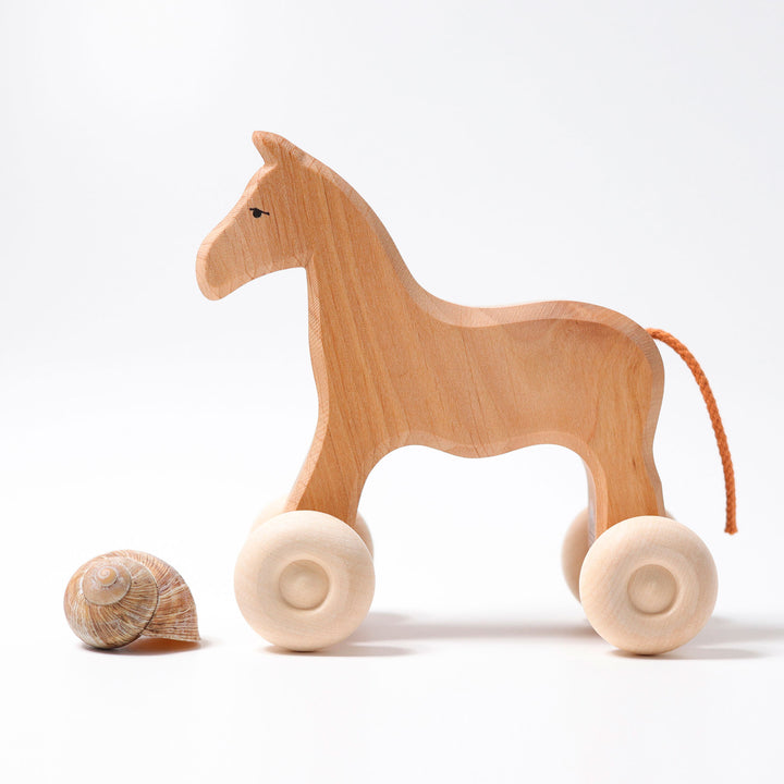 Cheval en bois a rouler