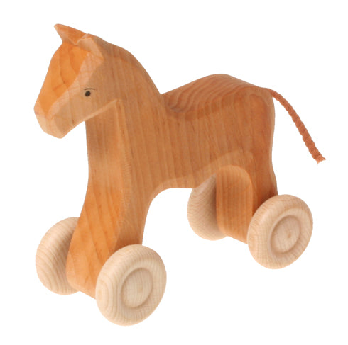 Cheval en bois a rouler