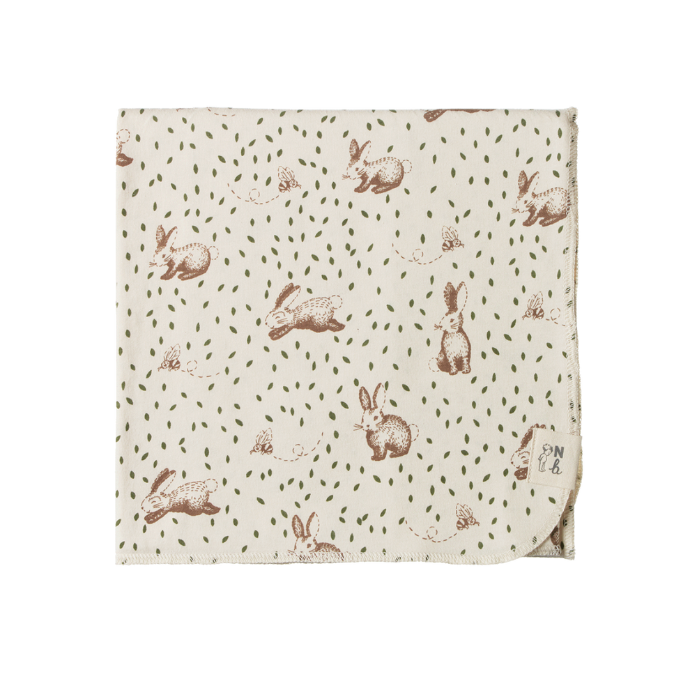 Couverture en coton beige avec imprimé lapins