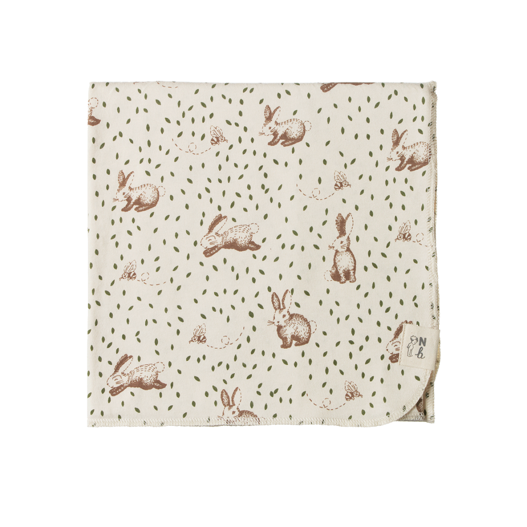 Couverture en coton beige avec imprimé lapins