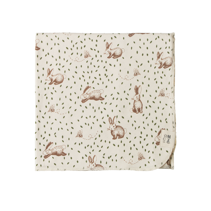 Couverture en coton beige avec imprimé lapins