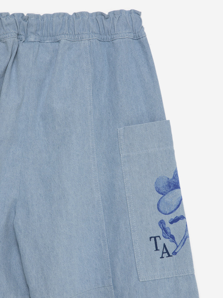 Pantalon en denim pour enfant avec imprimé herbier sur les côtés