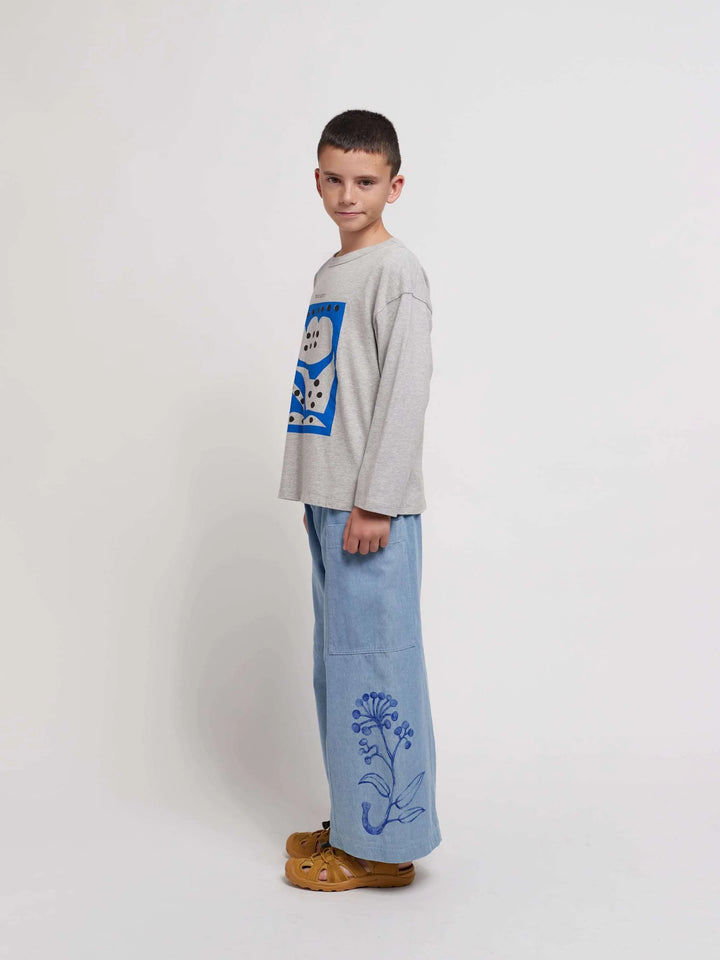 Garçon avec Pantalon en denim pour enfant avec imprimé herbier sur les côtés