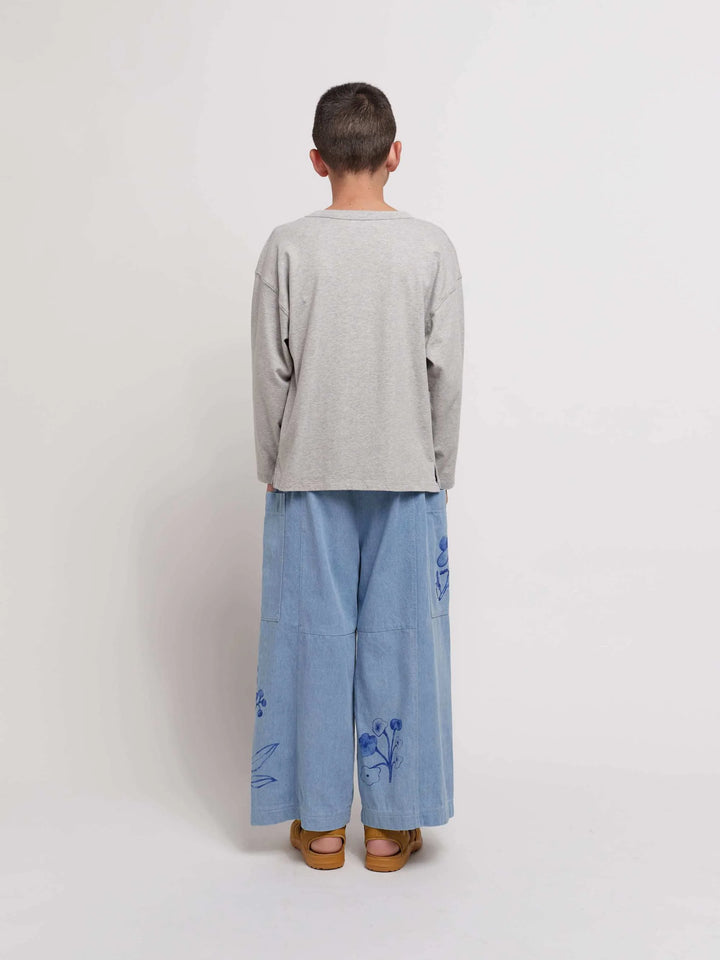 Garçon avec Pantalon en denim pour enfant avec imprimé herbier sur les côtés