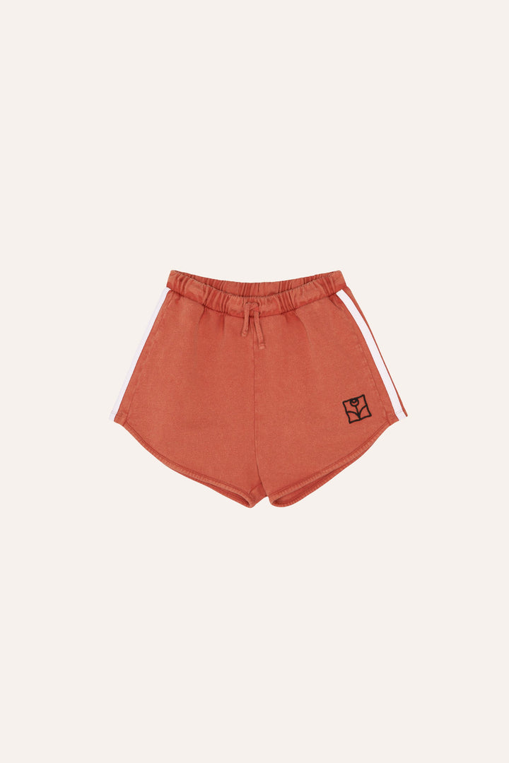 Short sportif en coton rouge délavé