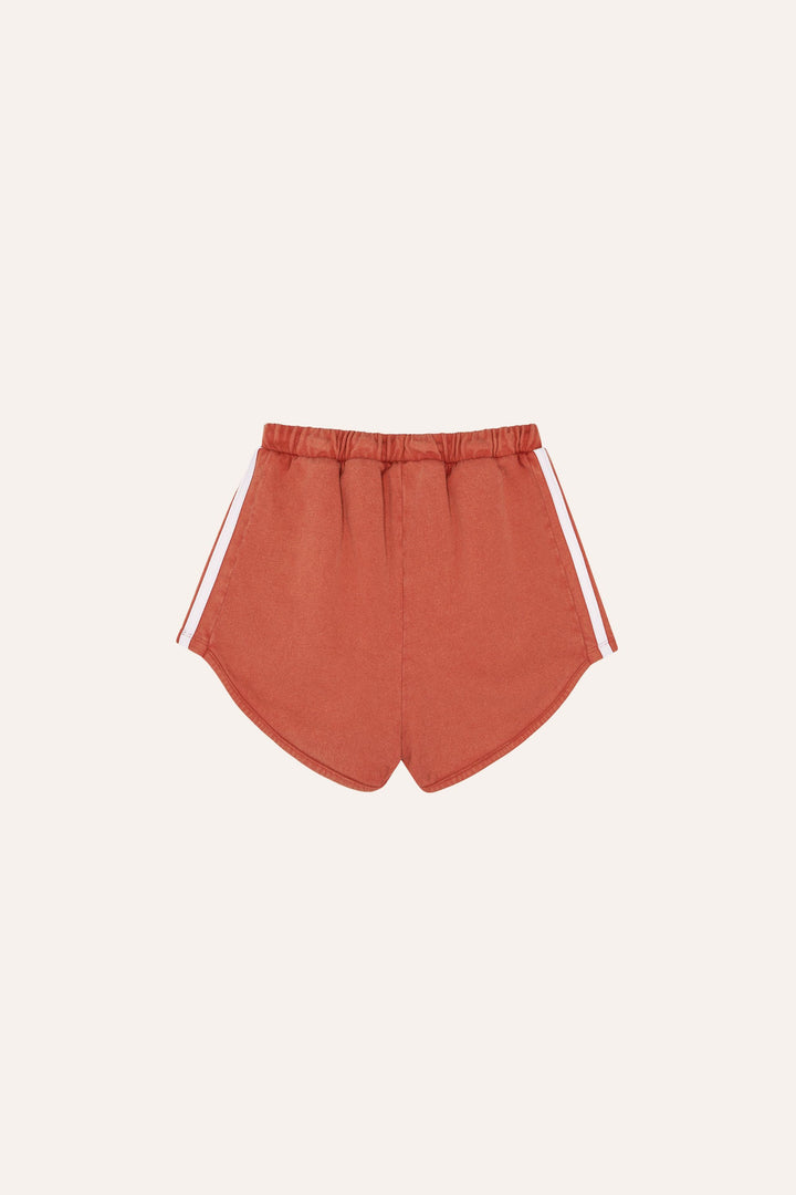 Short sportif en coton rouge délavé