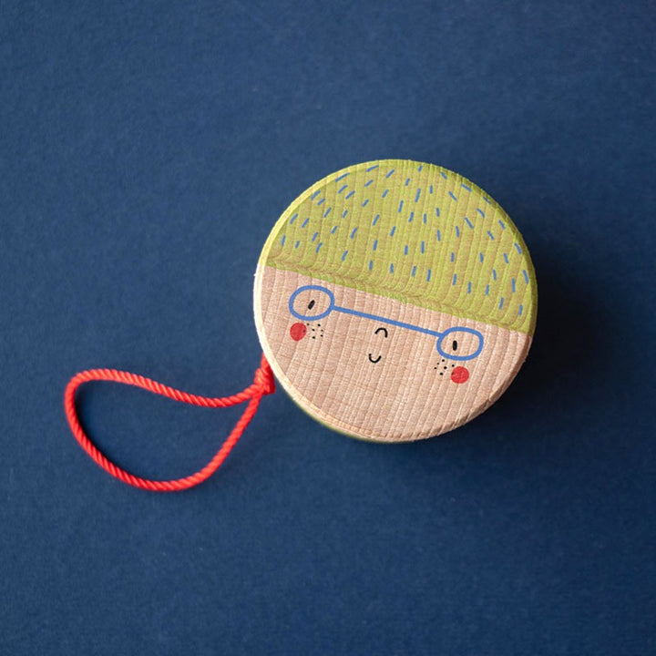 Yoyo en bois avec illustration de visage