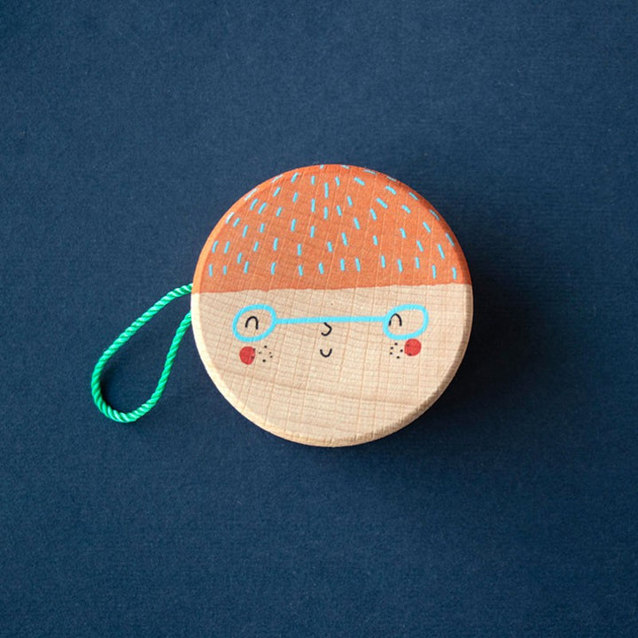 Yoyo en bois avec illustration de visage