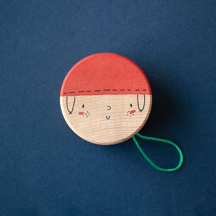 Yoyo en bois avec illustration de visage