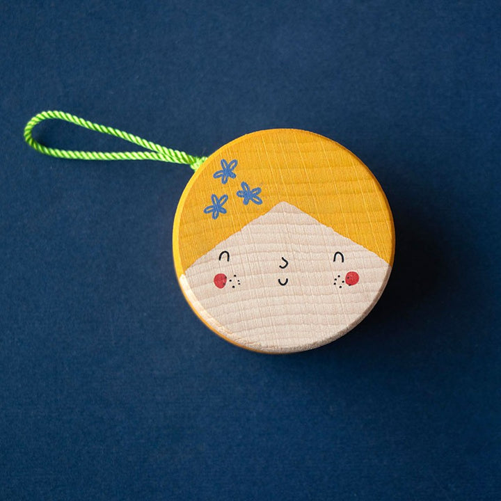 Yoyo en bois avec illustration de visage
