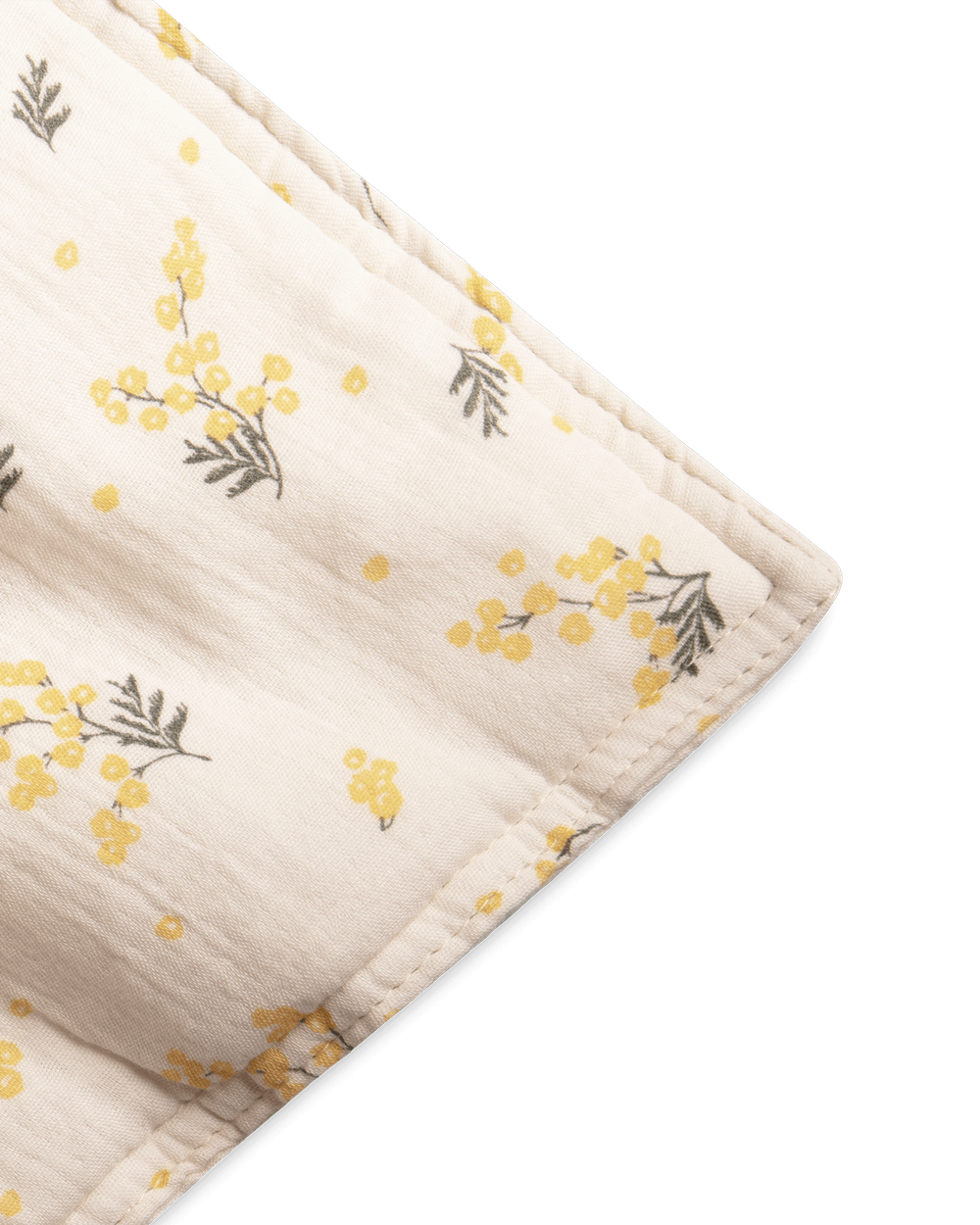 Couette en mousseline beige avec jeune Mimosa