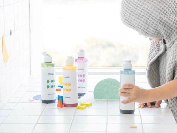 bottles of plop plop colored bubble bath by nahthing project