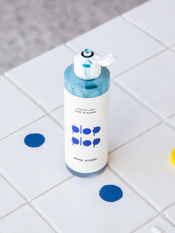 bottle of plop plop colored bubble bath by nahthing project in ocean blue