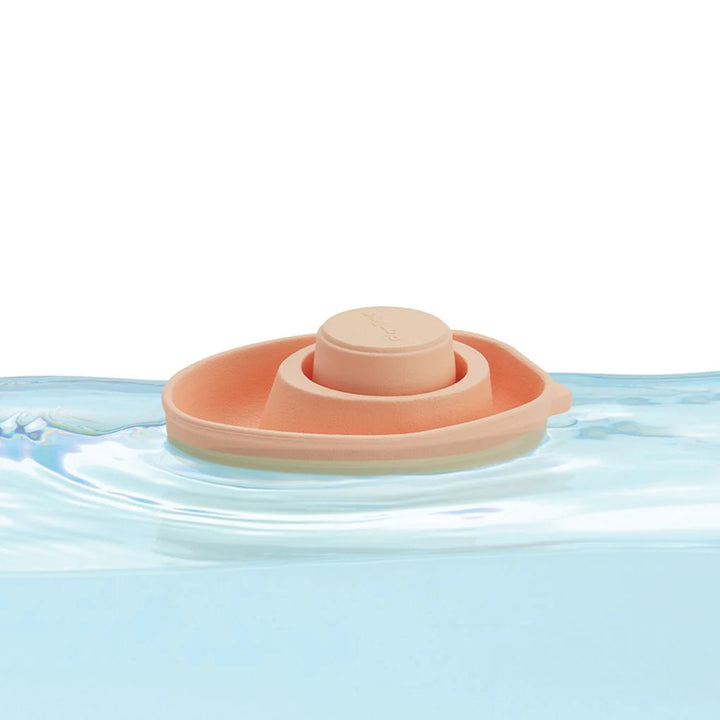 Bateau convertible en caoutchouc orange pastel Plan Toys