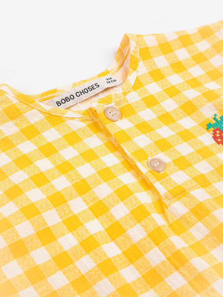 Détail de Blouse Bobo Choses en coton carré jaune et blanc avec fraise brodée