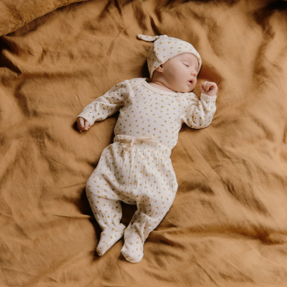 Bébé avec Body manches longues pointelle en coton beige avec imprimé tulipes
