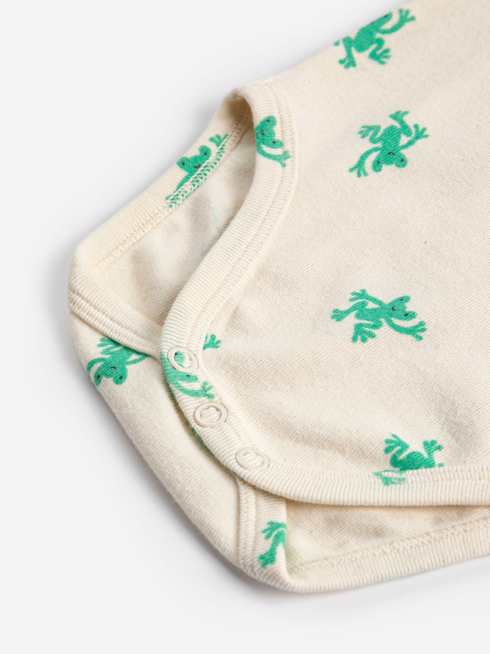 Détail de Body Bobo Choses en coton crème avec imprimé grenouilles vertes
