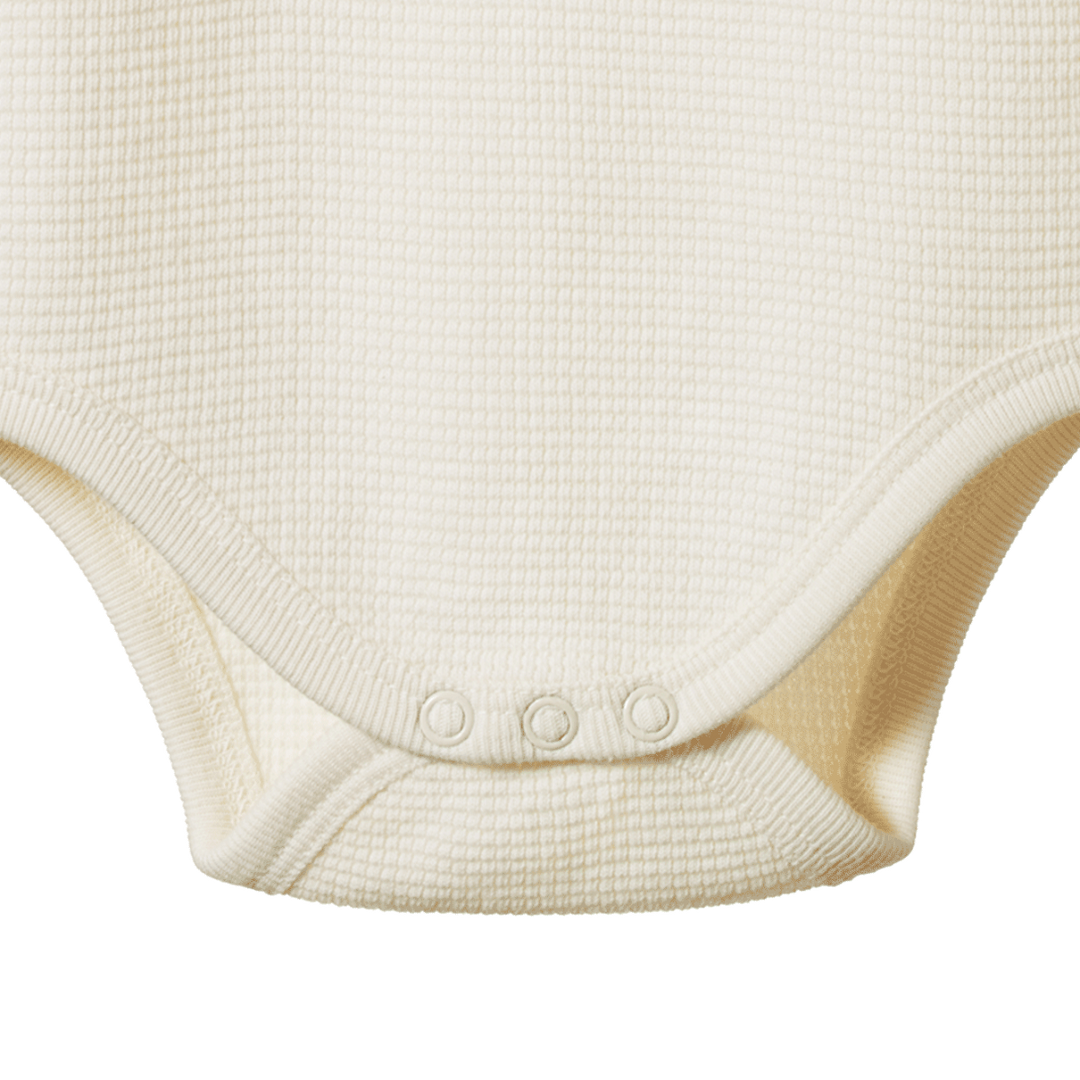 Détail de Body manches longues en coton gaufré naturel