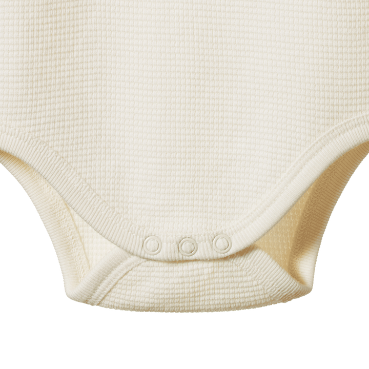 Détail de Body manches longues en coton gaufré naturel