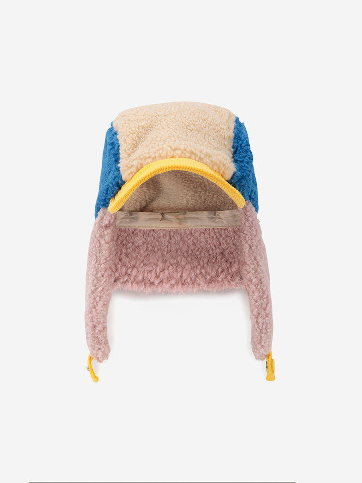 Chapka Bobo Choses en peau de mouton bleu, mauve, jaune et beige