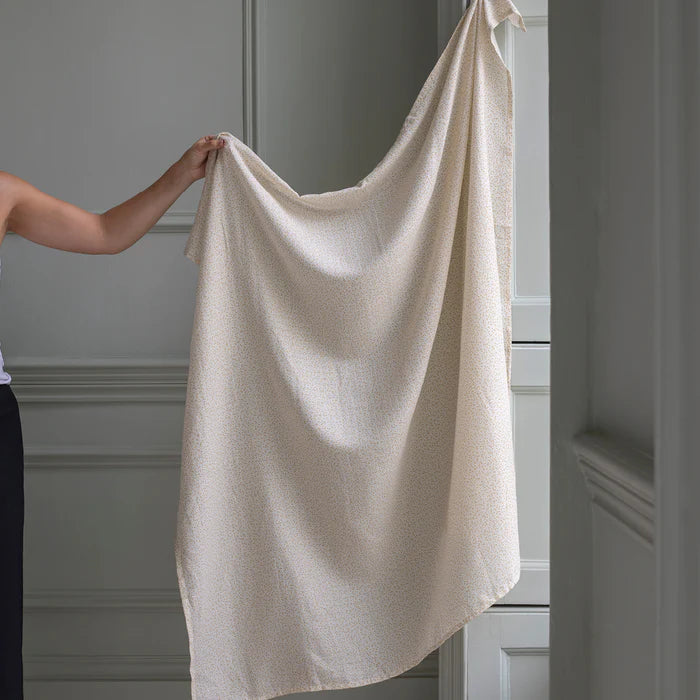 Couverture d'emmaillotage en coton avec imprimé marguerites
