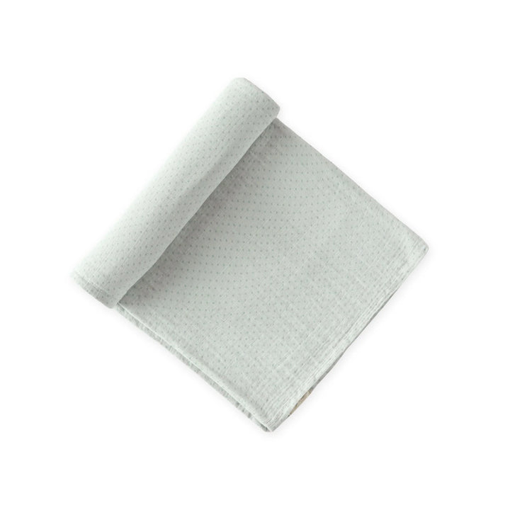 Couverture d'emmaillotage en coton points verts