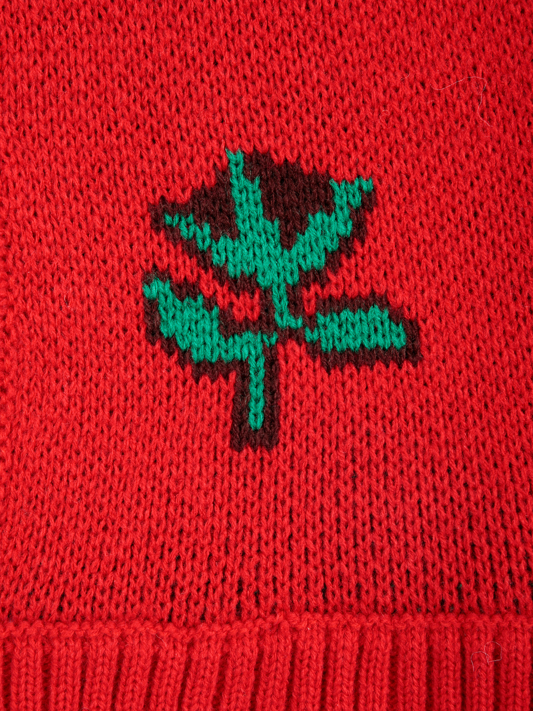 Détail de Balaclava Bobo Choses tricotée en acrylique rouge avec fleur verte