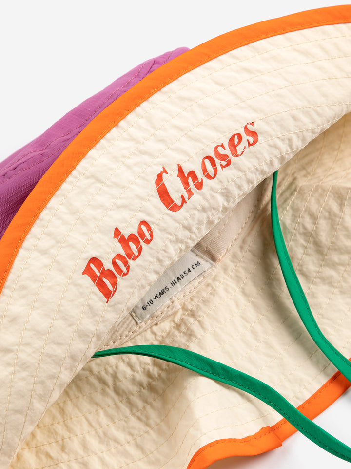 Détail de Chapeau pêcheur Bobo Choses rose, blanc, orange et vert
