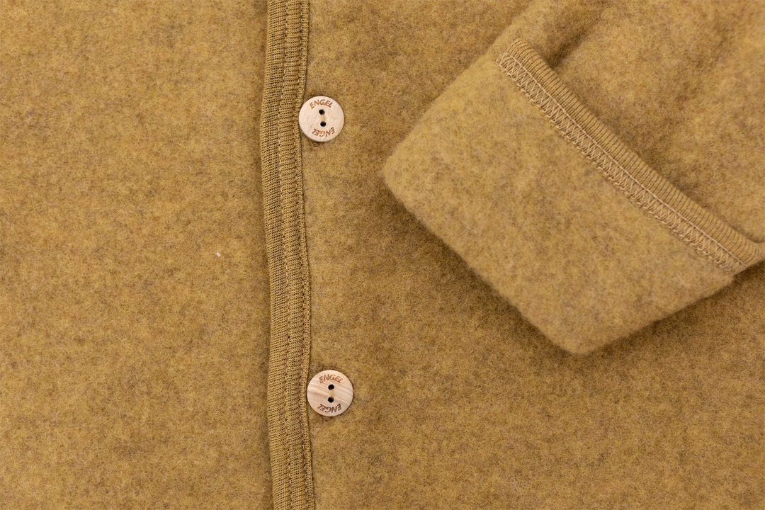 Détail de Combinaison Engel chaude en mérinos safran