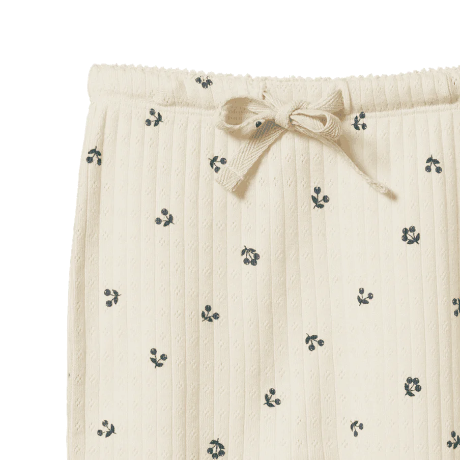 Détail de Pantalon à pattes pointelle en coton blanc avec imprimé baie d'hiver