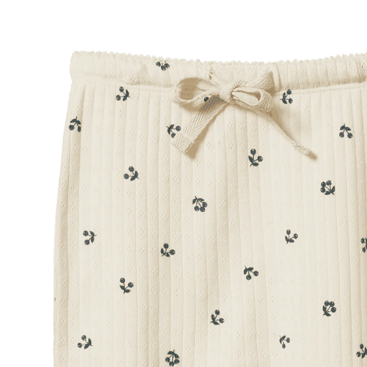 Détail de Pantalon à pattes pointelle en coton blanc avec imprimé baie d&