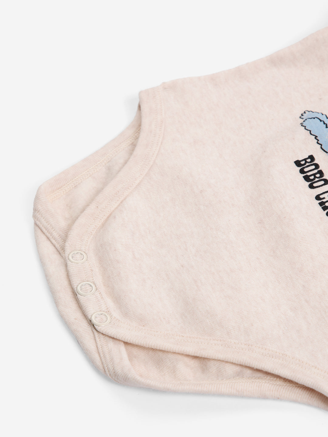 Détail de Body Bobo Choses en coton beige avec imprimé monstre bleu