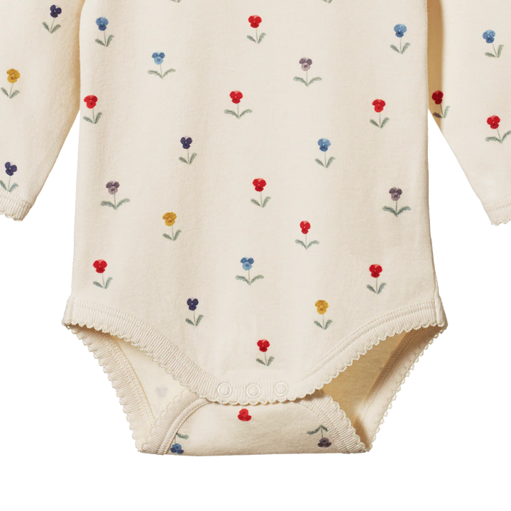 Détail de Body manches longues Nature Baby en coton écru imprimé fleurs