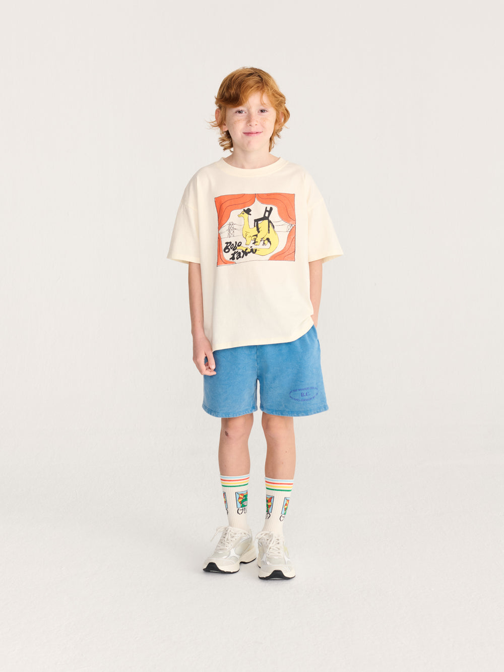 Enfant avec T-shirt Bobo Choses en coton blanc avec imprimé taxi dinosaure