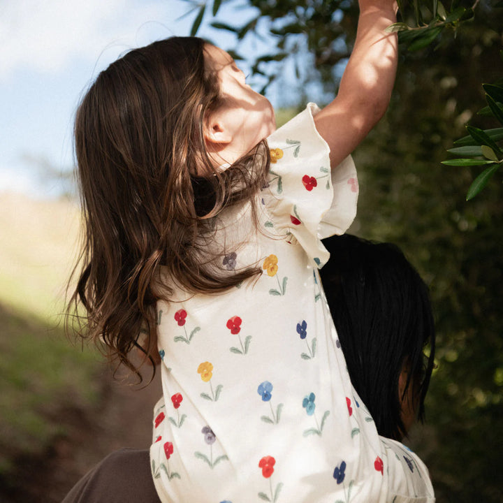 Enfant avec Une-pièce Nature Baby en coton blanc imprimé fleurs