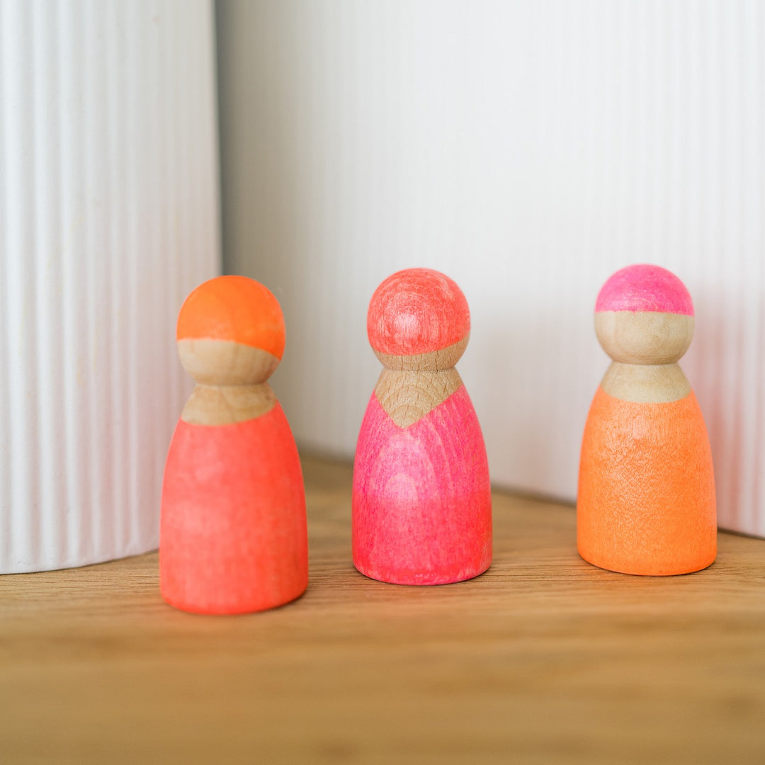 Figurines en bois Rose fluo
