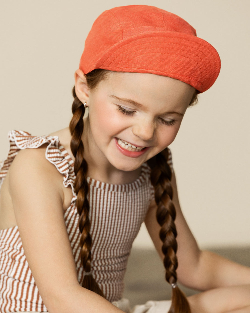 Fille avec Casquette en lin Caribou pamplemousse 