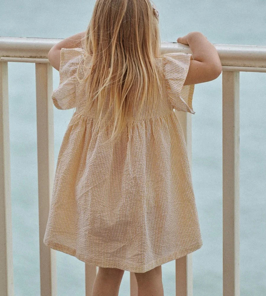 Fille avec Robe Nature Baby en coton rayé jaune